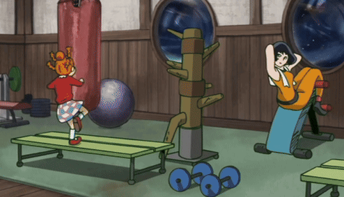 a cartoon of a girl kicking a boxing bag