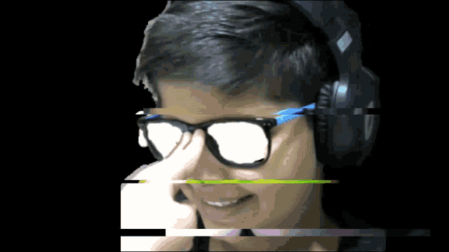 a boy wearing glasses and headphones is smiling with a glitch effect