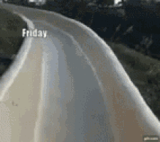 a road with the words friday on the side of it