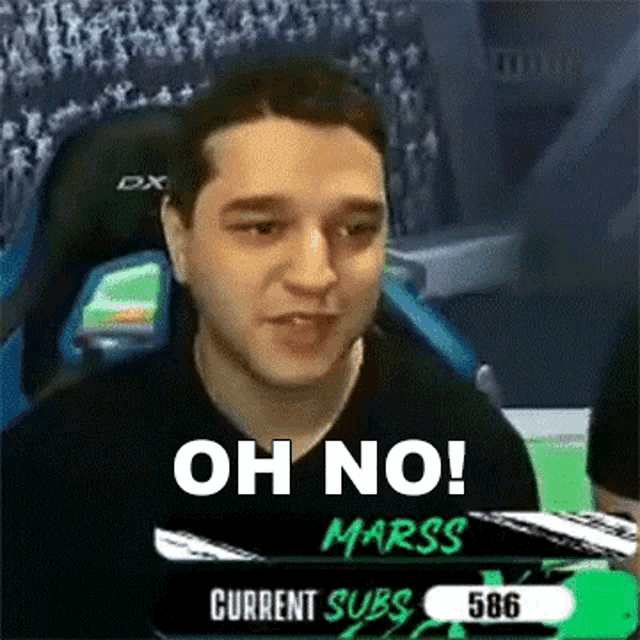 a man is sitting in a chair with the words oh no written on the screen