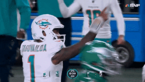 a football player wearing a helmet with the number 1 on the back