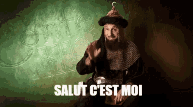 a man in a costume with salut c'est moi written on the bottom