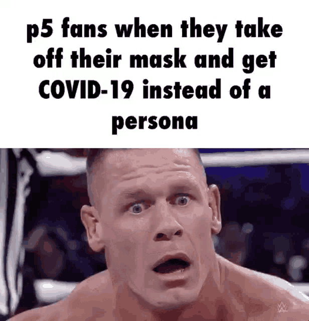 a man is making a surprised face in a wrestling ring .
