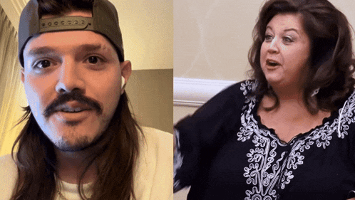 a man with a mustache is next to a woman with a white shirt