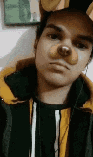 a man wearing a fake nose and ear buds