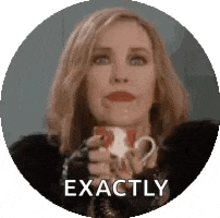 a woman is holding a cup of coffee and saying `` exactly '' in a circle .