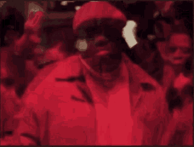 a pixelated image of a man with the letter p visible