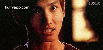 a close up of a person 's face with the words kulfyapp.com on the bottom right