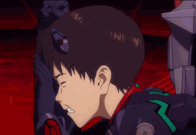 a close up of a cartoon character 's face with the letter n on his head