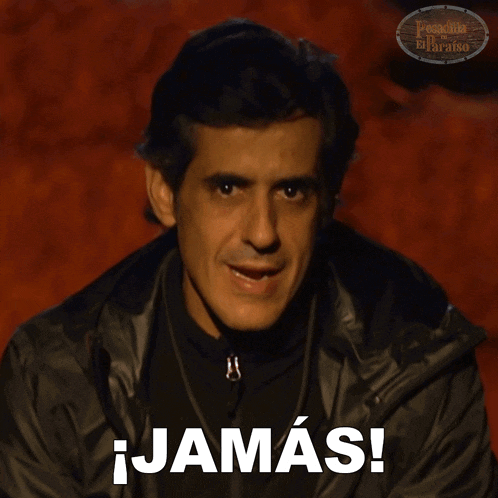 a man in a black jacket is pointing at the camera and says jamas
