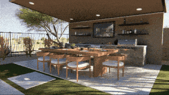 a patio with a table and chairs and a television
