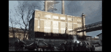 a group of people standing in front of a building