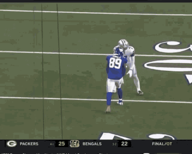 a football game is being played between the packers and bengals