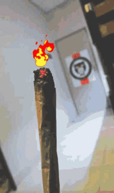 a cartoon drawing of a cigarette with a fire coming out of it