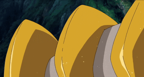 a close up of a yellow object with a gray stripe on the bottom