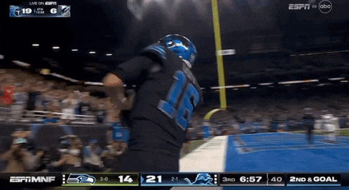 a football game is being played on espn