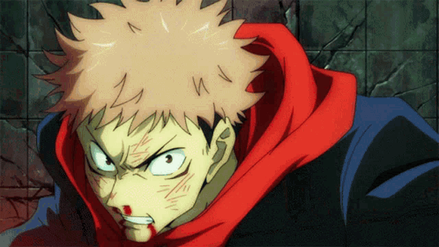 a close up of a person 's face with a red scarf around their neck