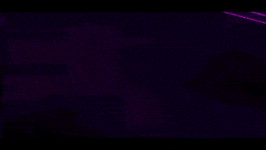 a video game character is holding a purple object in his hand