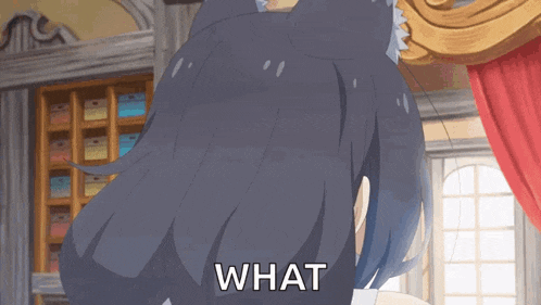a girl with long black hair is standing in front of a window and says " what "