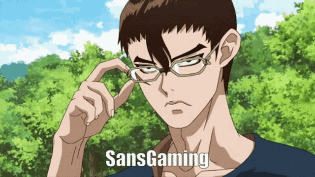 a man wearing glasses has the word sans gaming written on his face