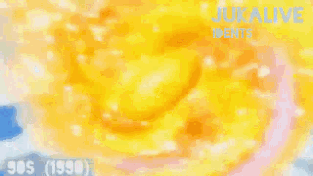 a computer generated image of a yellow circle with a red circle in the middle