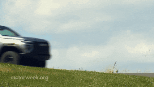 a car is driving down a road with motorweek.org written on the bottom right