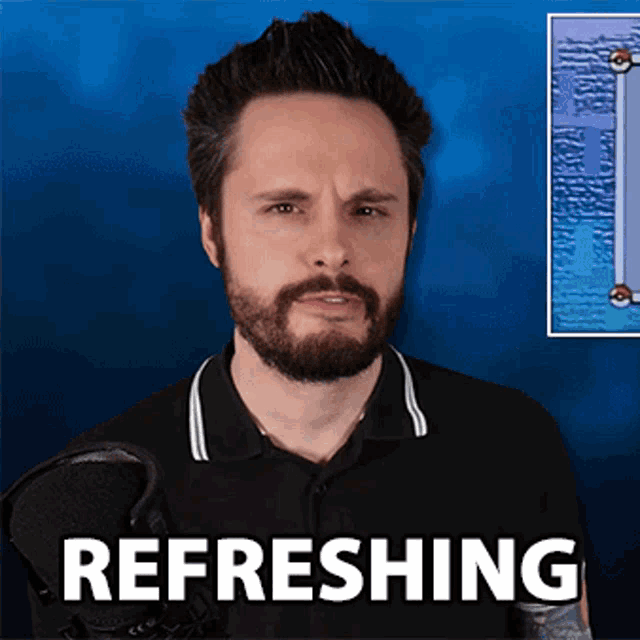 a man with a beard is standing in front of a microphone with the word refreshing written on the bottom