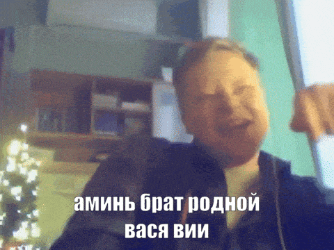 a blurry picture of a man with a foreign language caption behind him