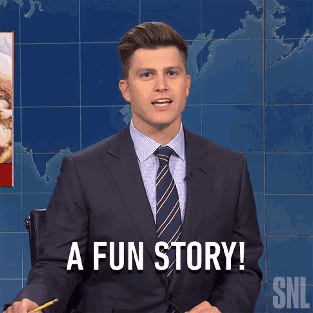 a man in a suit says a fun story