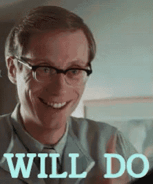 a man wearing glasses is smiling with the words will do written below him