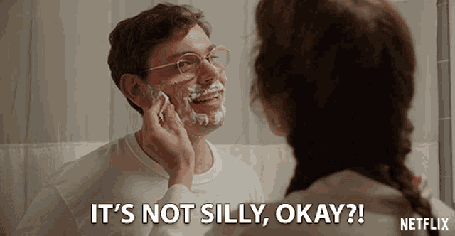 a man with shaving cream on his face says it 's not silly okay netflix