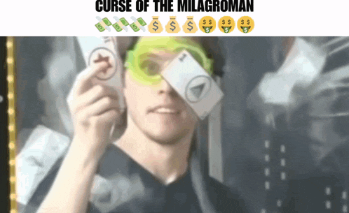 a man wearing goggles holds a card in front of his eye and says curse of the milagrosman on the bottom