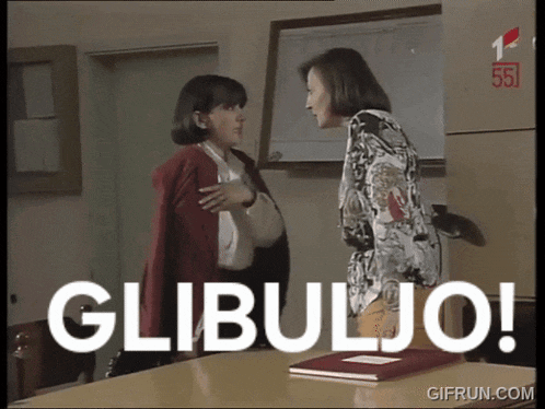 two women standing next to each other with the word glibulo written on the screen