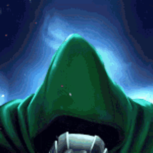 a person in a green hooded cape with a blue background