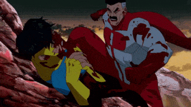 a man in a red suit is holding another man in a yellow suit
