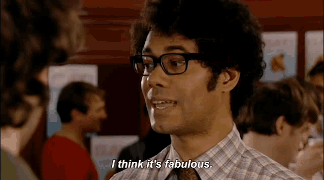 a man with glasses and a plaid shirt says i think it 's fabulous