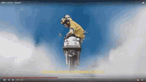 a video of a man riding a motorcycle is titled mike lennon alligator