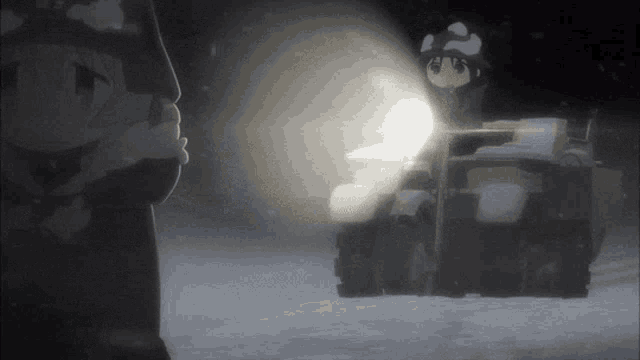 a person is standing next to a snow blower in the snow