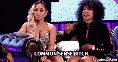 two women are sitting on a couch and one of them is saying common sense bitch .