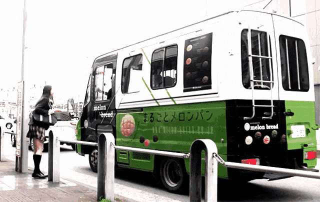 a green and white van that says melon bread