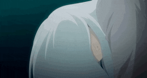 a close up of a person 's face with white hair .