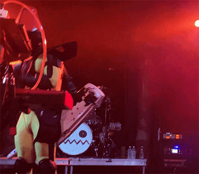 a person holding a keyboard that says ass synth