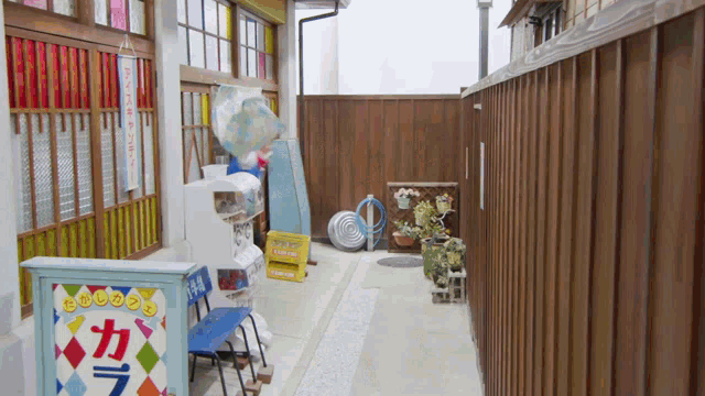 an alleyway with a sign that says " candy "