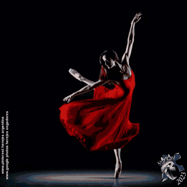a woman in a red dress is dancing in front of a blue background