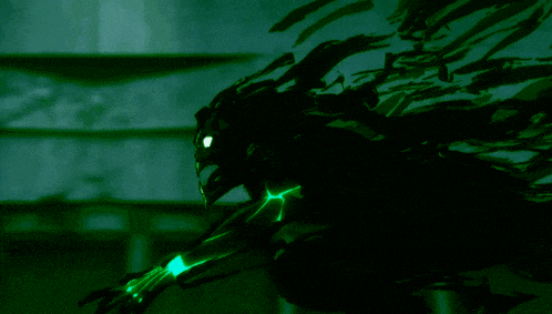 a dark green background with a green glowing object in the middle