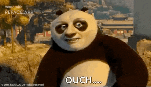a panda bear from kung fu panda is making a funny face while standing in front of a building .