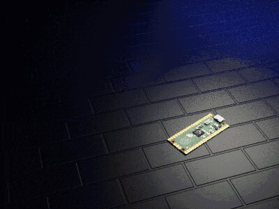 a motherboard is laying on a brick floor