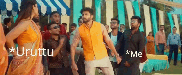 a man is dancing in front of a crowd of people .