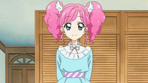 a girl with pink hair and blue eyes stands in front of a closet