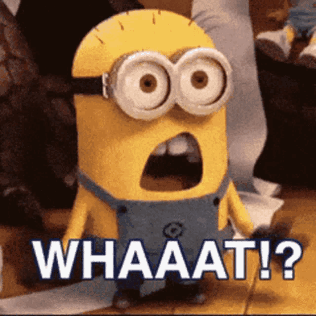 a minion with a surprised look on his face and the words whaaat on the bottom
